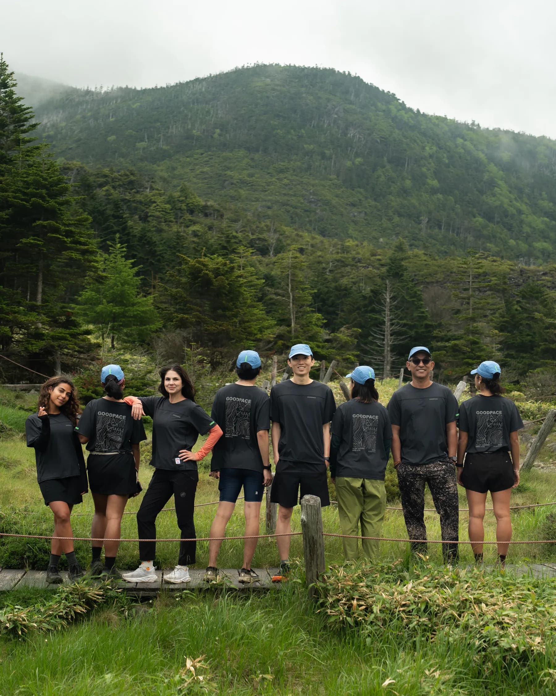 The cohort lined up along a ridge